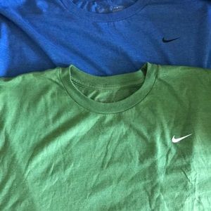 Two men’s Nike shirts